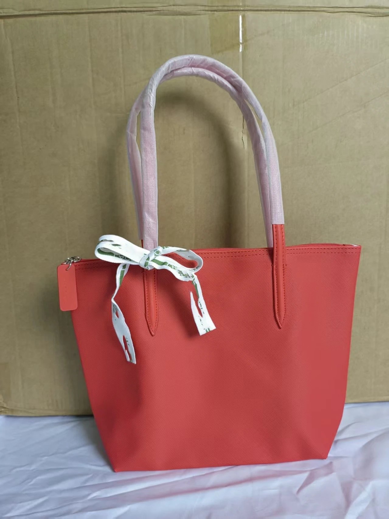 Lacoste Handbags Zip-top tote bag with long shoulder handles — Medium size, bright red