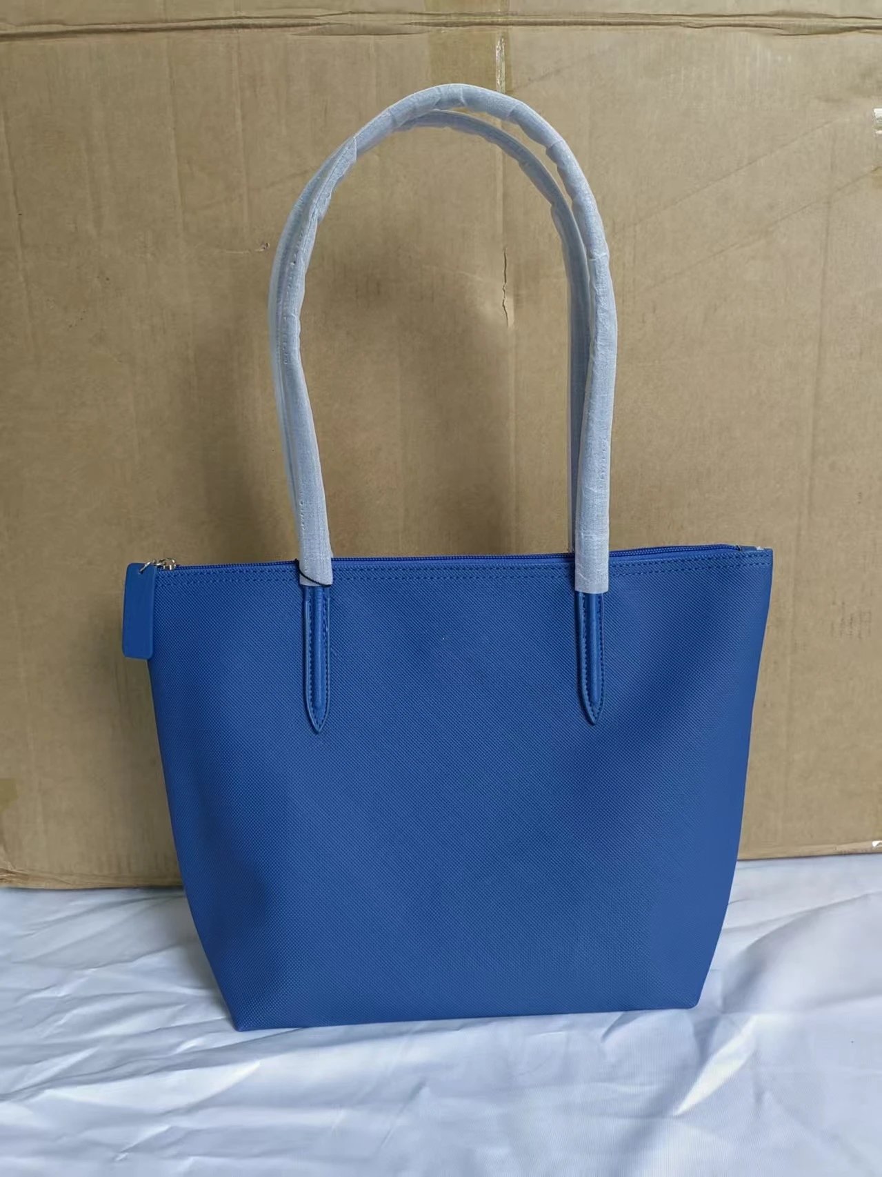 Lacoste Handbags Zip-top tote bag with long shoulder handles — Medium size, sky blue
