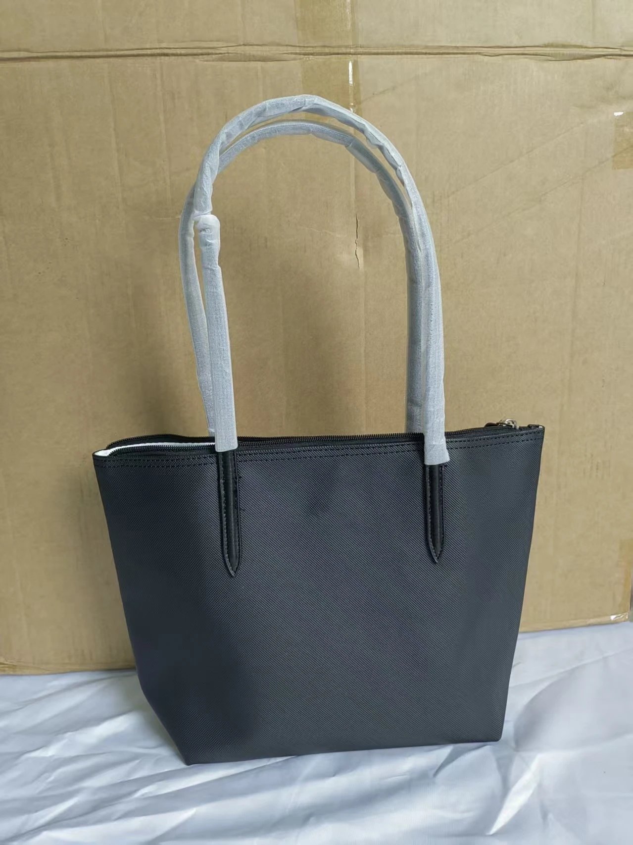 Lacoste Handbags Zip-top tote bag with long shoulder handles — Medium size, black