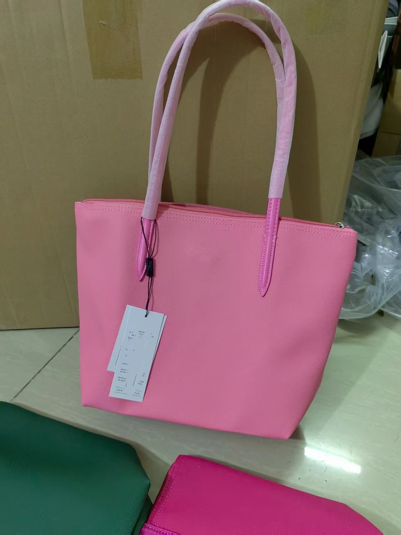 Lacoste Handbags Zip-top tote bag with long shoulder handles — Medium-sized coral pink