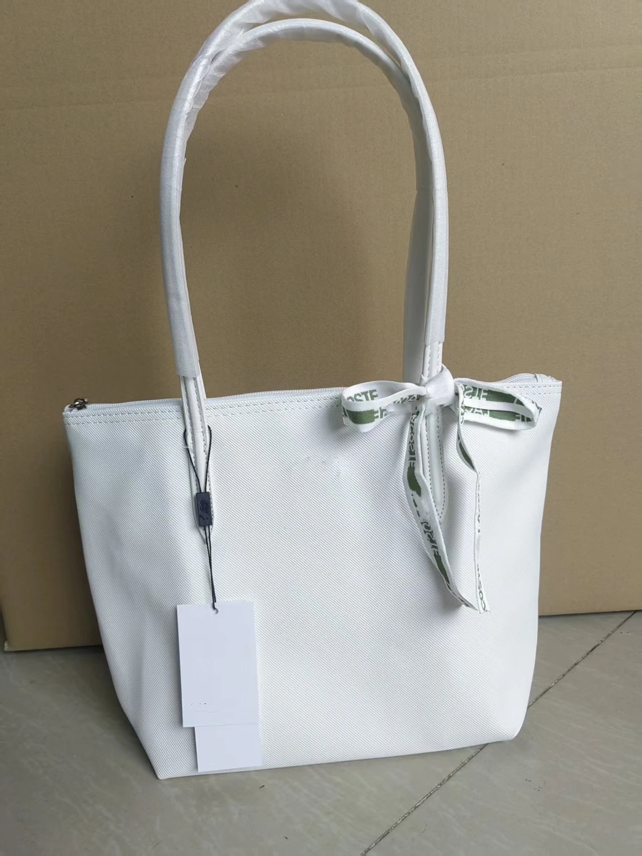 Lacoste Handbags Zip-top tote bag with long shoulder handles — Medium size, white