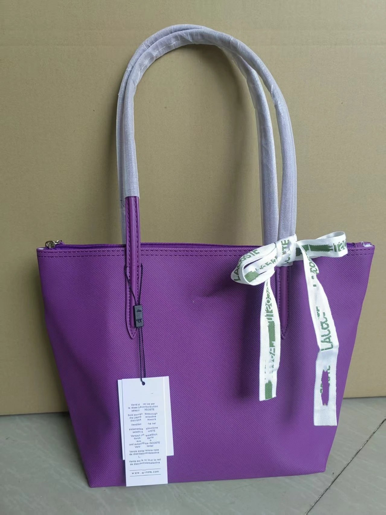 Lacoste Handbags Zip-top tote bag with long shoulder handles — Medium size, purple