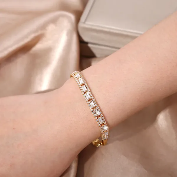 Design Tennis Bracelet Gold-Tone with Baguette and Round Cubic Zirconia Jewelry - 1