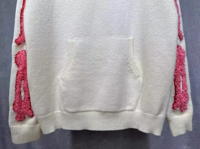 Amiri Knitwear Hooded knit sweater with textured sleeve motifs and kangaroo pocket product detail image 4