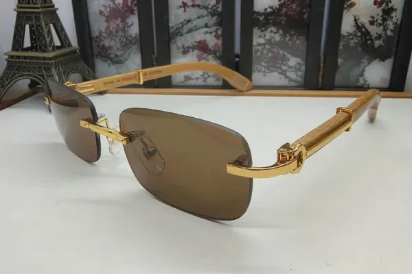 Design Rimless Sunglasses with Gold-tone Metal and Wood Temples Brown Lens Eyewear - 1
