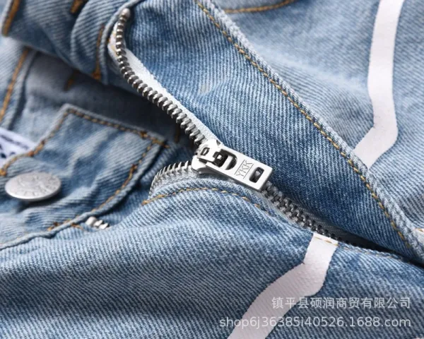 A Bathing Ape x Unknown Collaborator Cat-Print Denim Jeans - 27