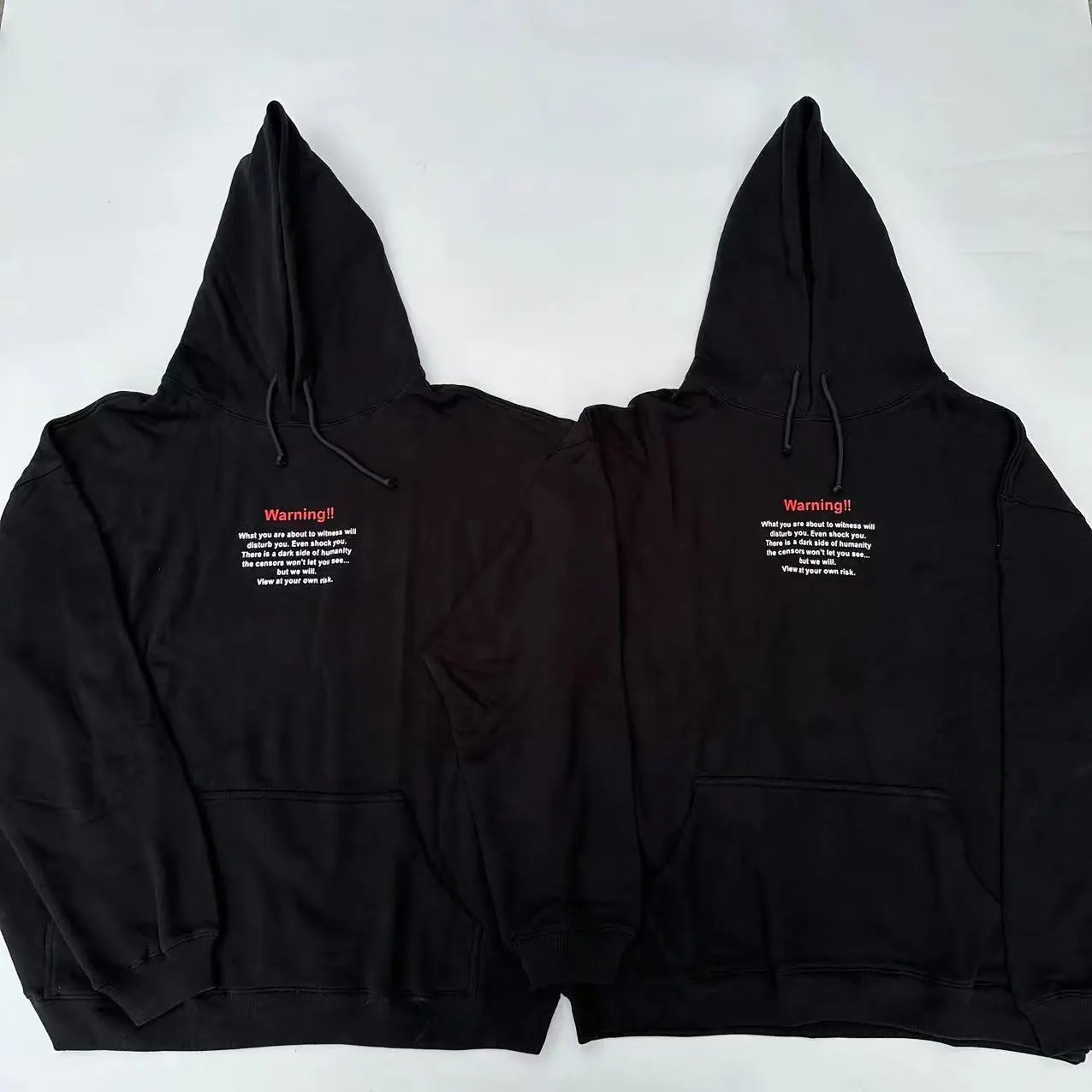 Black Hoodie with Warning Text Design