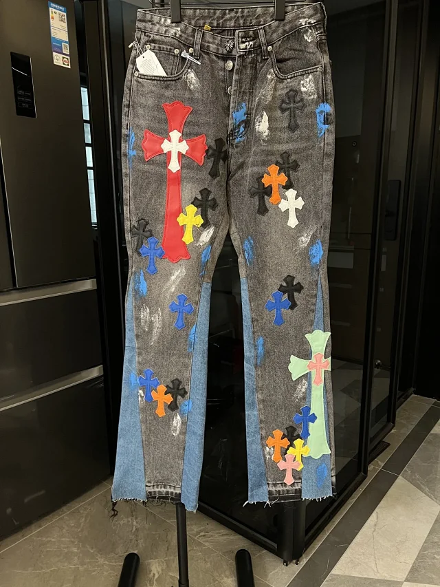 Unbranded Jeans Two-tone washed denim with multicolor cross appliqués and raw hems product detail image 3
