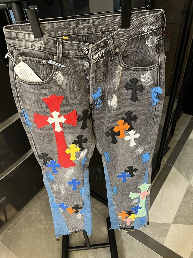 Unbranded Jeans Two-tone washed denim with multicolor cross appliqués and raw hems product detail image 5