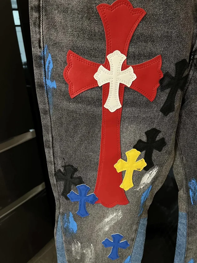 Unbranded Jeans Two-tone washed denim with multicolor cross appliqués and raw hems product detail image 9