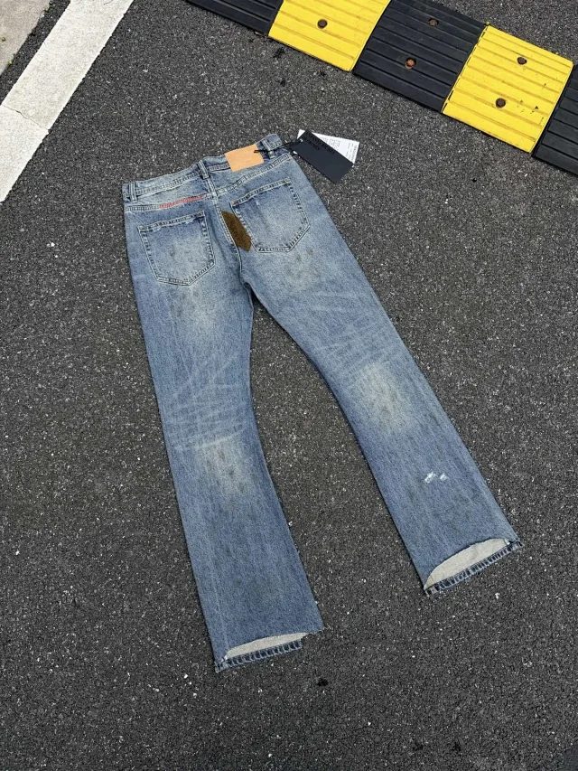 Enfants Riches Déprimés Jeans Washed patchwork flared with embroidered motif product detail image 4