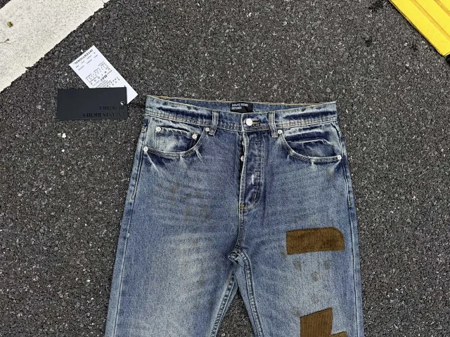 Enfants Riches Déprimés Jeans Washed patchwork flared with embroidered motif product detail image 6