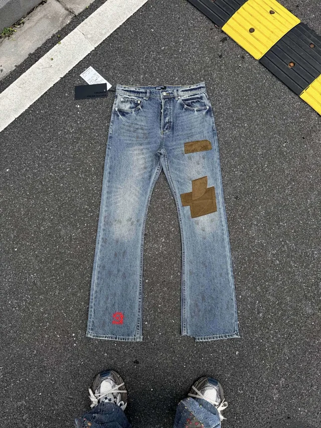 Enfants Riches Déprimés Jeans Washed patchwork flared with embroidered motif product detail image 11