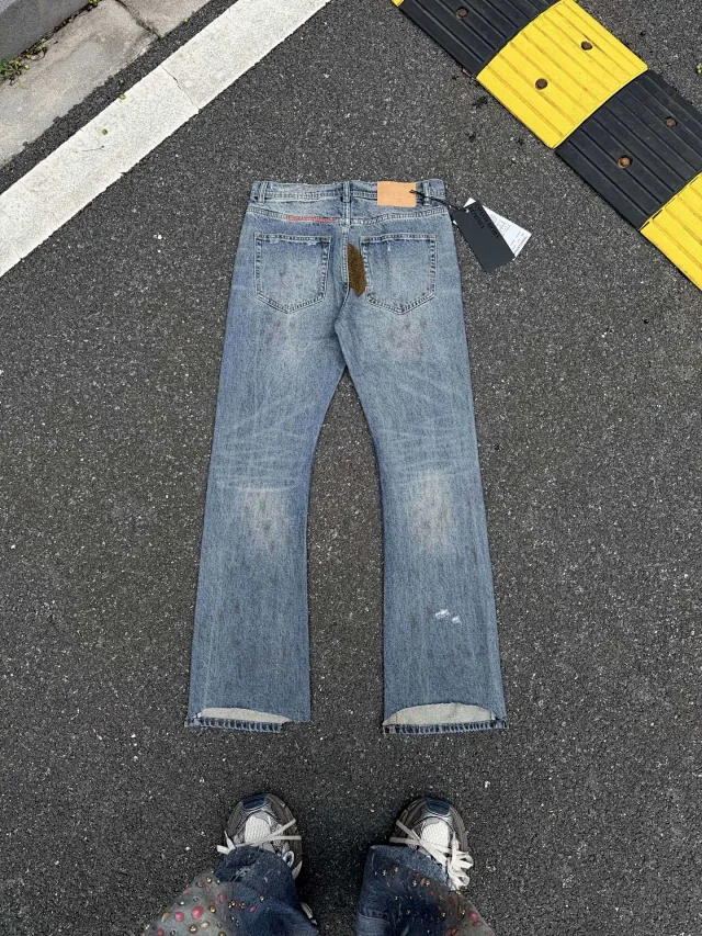Enfants Riches Déprimés Jeans Washed patchwork flared with embroidered motif product detail image 1