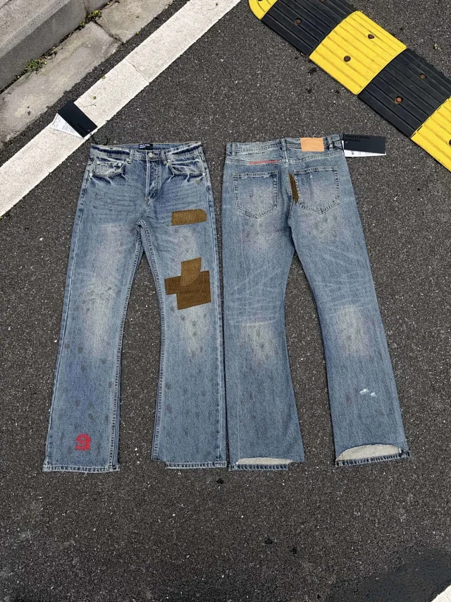 Enfants Riches Déprimés Jeans Washed patchwork flared with embroidered motif product detail image 3