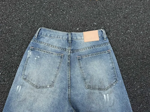 Acne Studios Jeans Distressed paint-splatter wide-leg product detail image 12