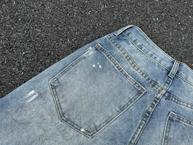 Acne Studios Jeans Distressed paint-splatter wide-leg product detail image 15