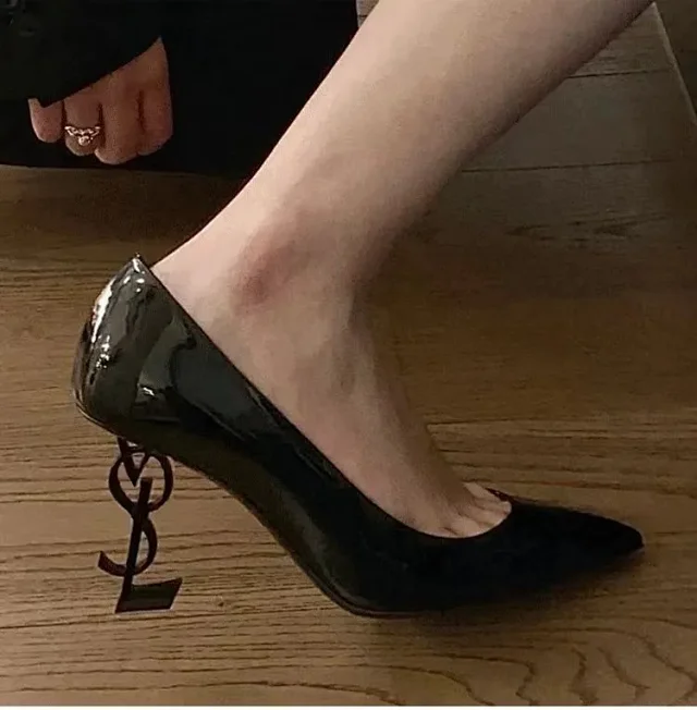 Saint Laurent High Heels Patent pointed-toe pumps with YSL logo product detail image 1