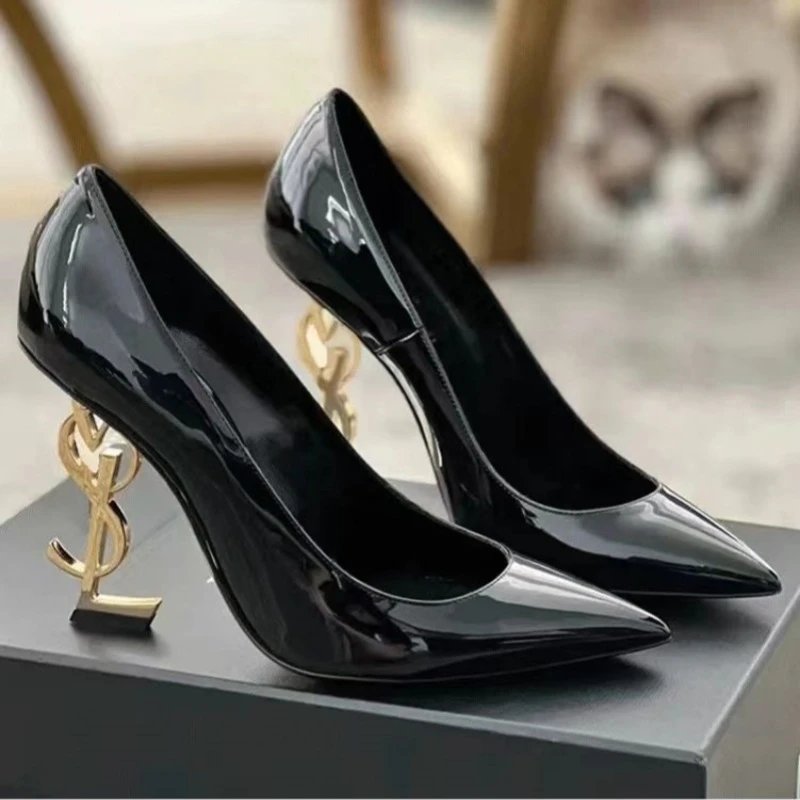Saint Laurent High Heels Patent pointed-toe pumps with YSL logo image 2