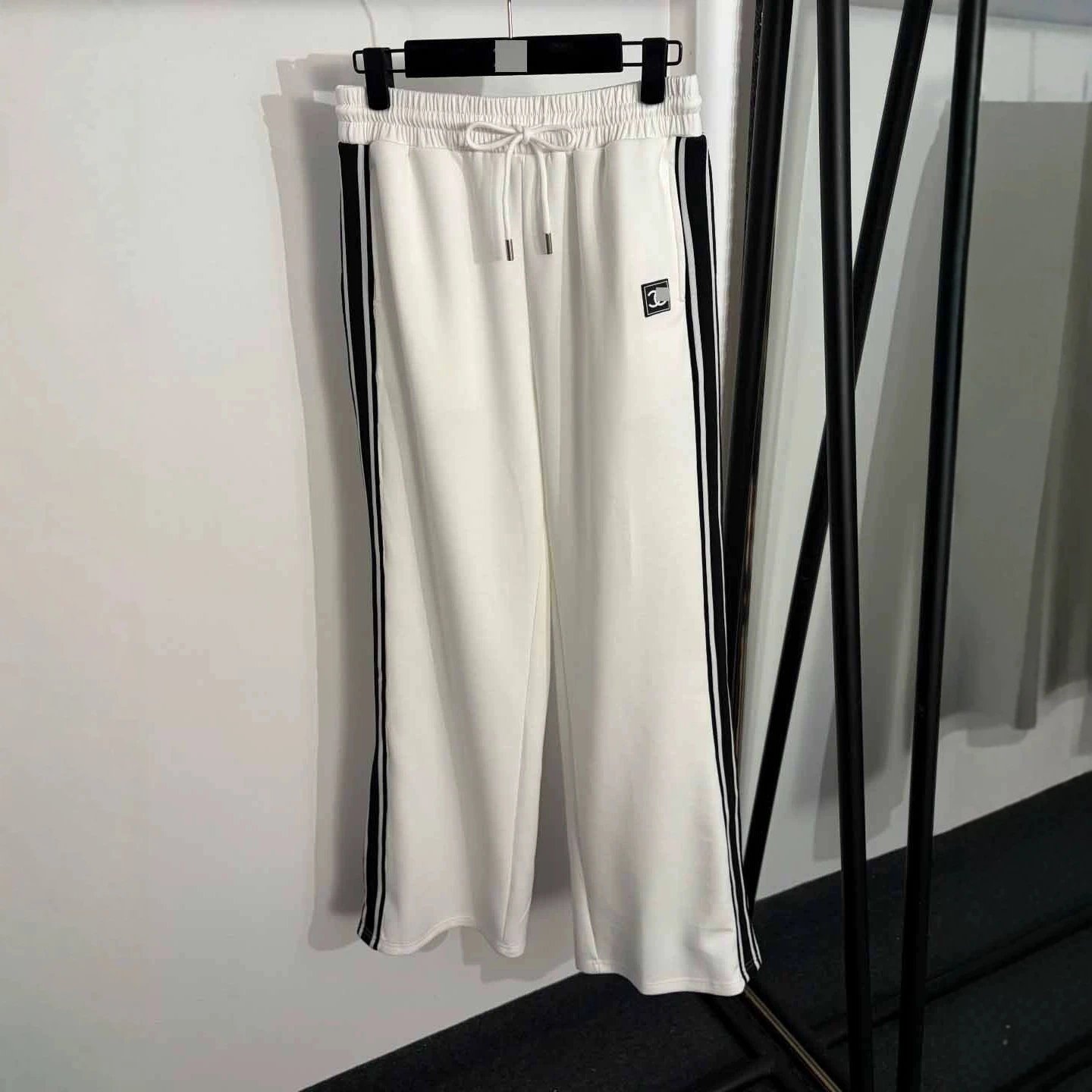 Chanel Tracksuits Short-sleeve zip-up track jacket and straight-leg trousers with contrast stripes image 4