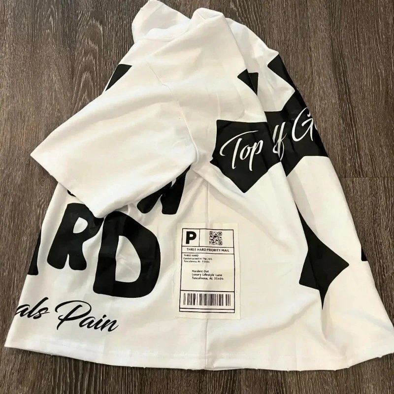 Design Graphic Print White T-Shirt with Black Typography and Shipping Label Detail