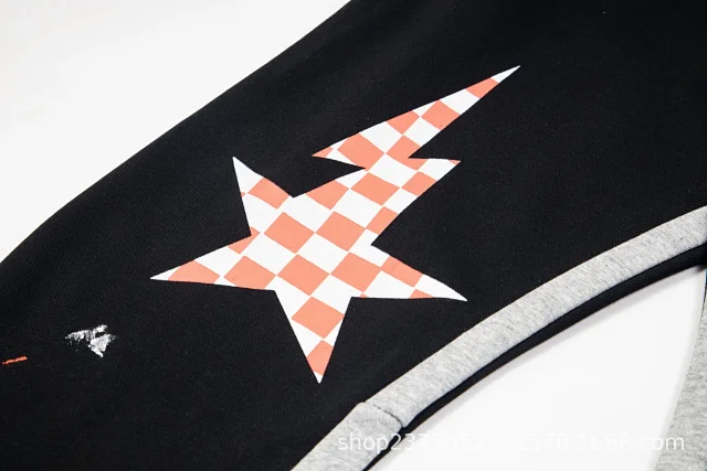 Galerie Dept. Trousers Paint-splatter graphic jogger with checkerboard star print and contrast side panels product detail image 13