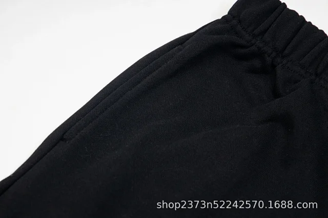 Galerie Dept. Trousers Paint-splatter graphic jogger with checkerboard star print and contrast side panels product detail image 15