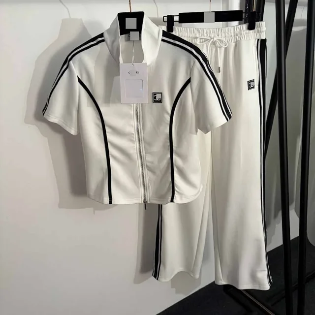 Chanel Tracksuits Short-sleeve zip-up track jacket and straight-leg trousers with contrast stripes product detail image 2