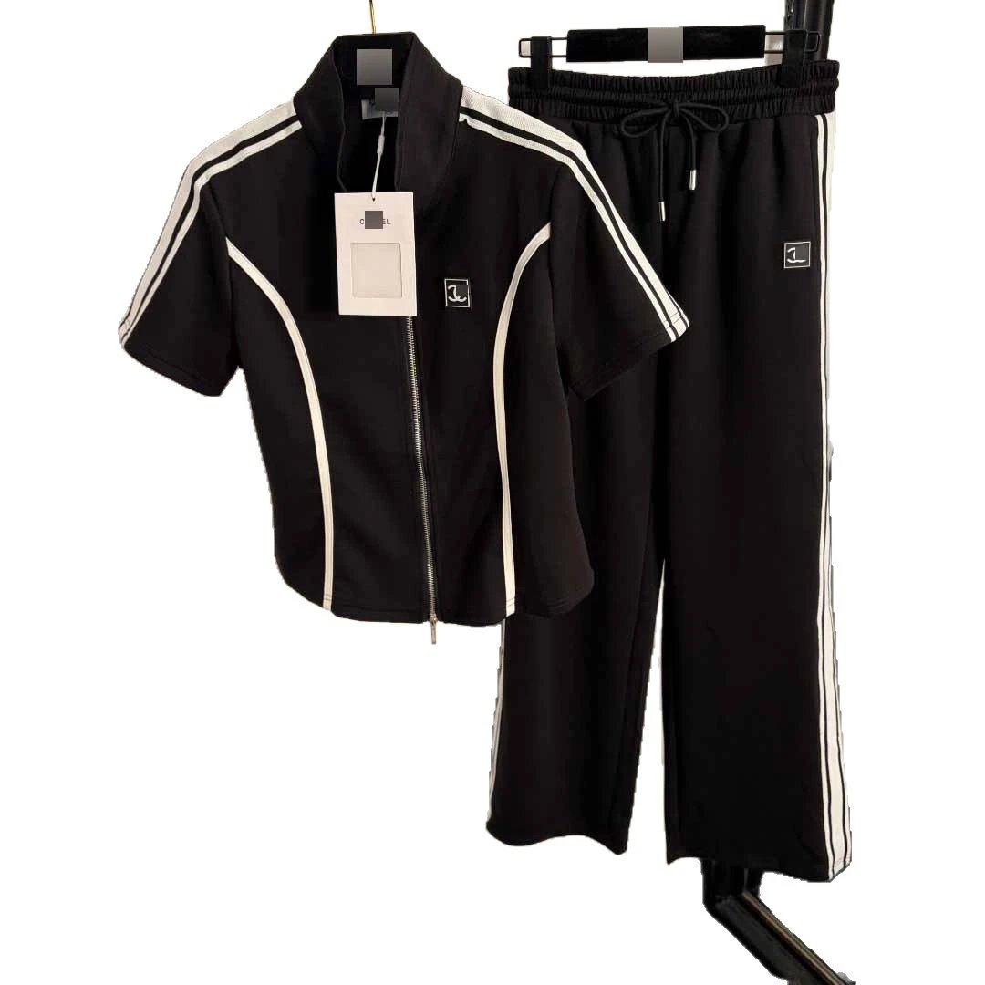 Chanel Tracksuits Short-sleeve zip-up track jacket and straight-leg trousers with contrast stripes image 5