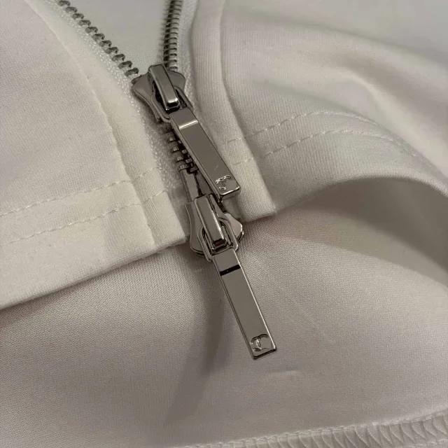 Chanel Tracksuits Short-sleeve zip-up track jacket and straight-leg trousers with contrast stripes product detail image 8