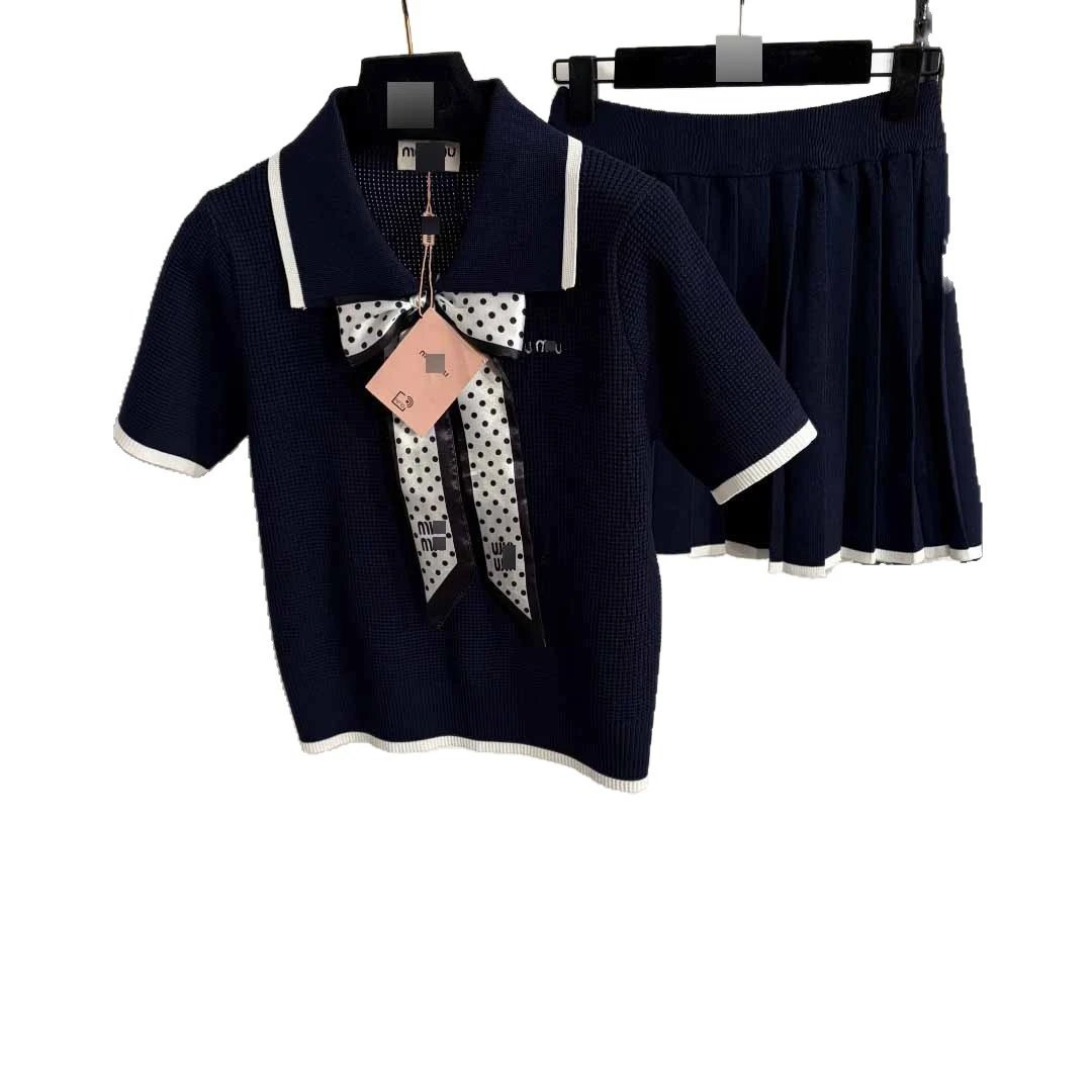 Miu Matching Sets Bow-detail short-sleeve knit top and pleated skirt set image 5