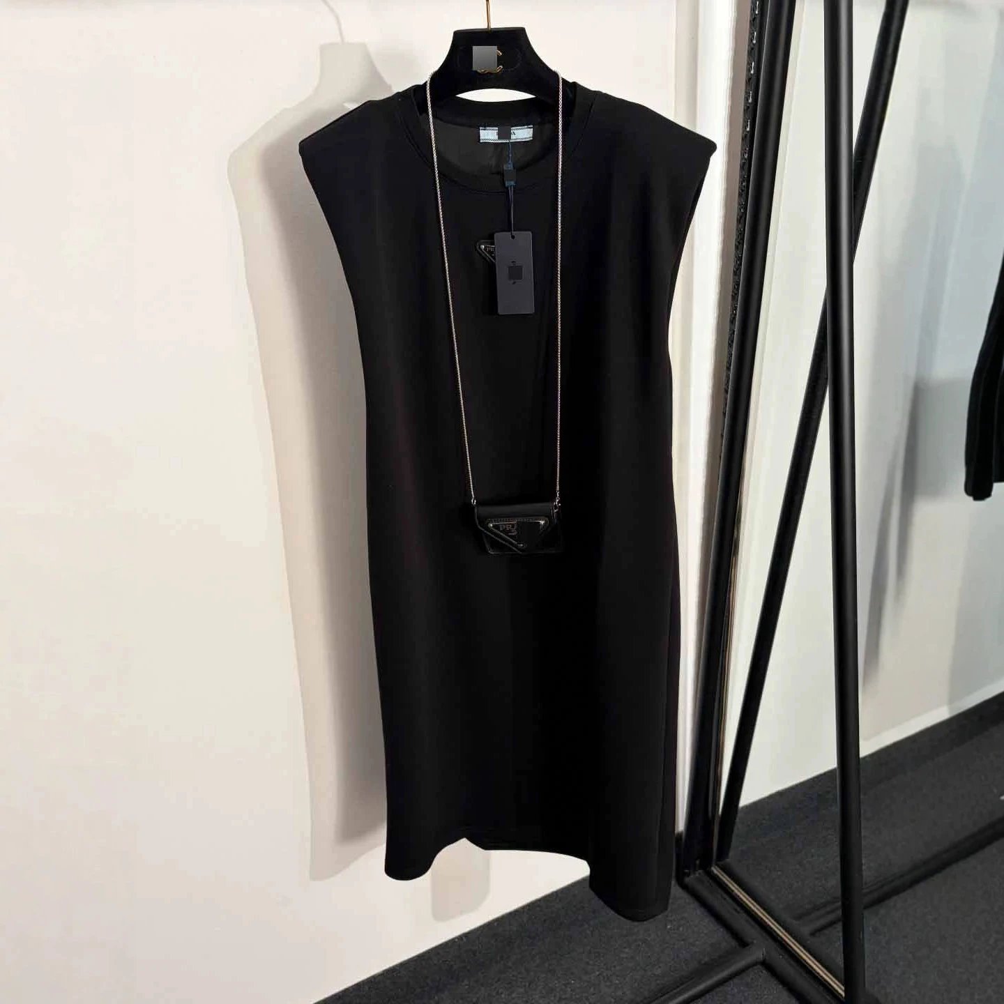 Prada Dresses Sleeveless padded-shoulder dress with triangle plaque and chain mini bag image 3