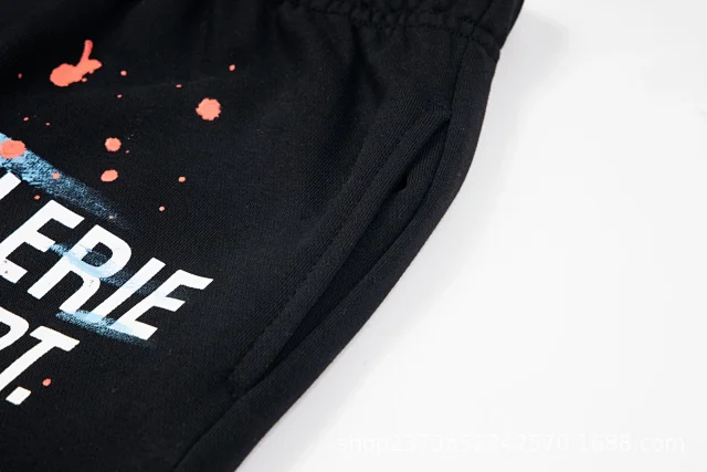 Galerie Dept. Trousers Paint-splatter graphic jogger with checkerboard star print and contrast side panels product detail image 17