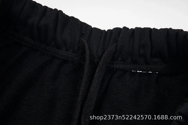 Galerie Dept. Trousers Paint-splatter graphic jogger with checkerboard star print and contrast side panels product detail image 19