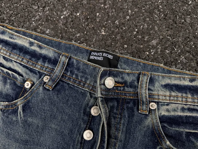 Enfants Riches Déprimés Jeans Washed patchwork flared with embroidered motif product detail image 9