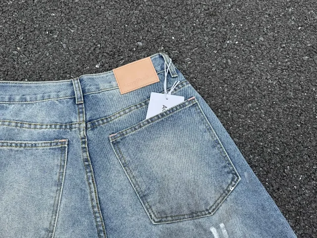 Acne Studios Jeans Distressed paint-splatter wide-leg product detail image 13