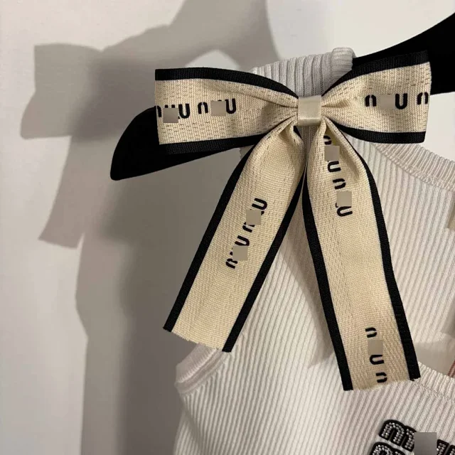 Miu Knitwear Ribbed Knit Bow-Shoulder Top product detail image 8