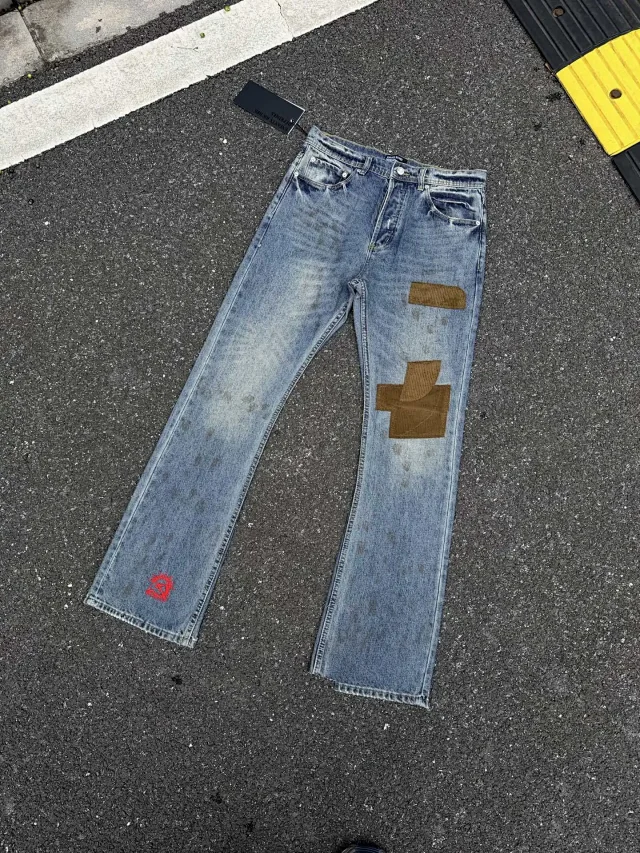 Enfants Riches Déprimés Jeans Washed patchwork flared with embroidered motif product detail image 5