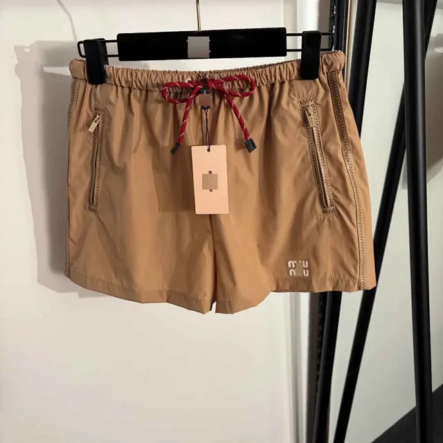 Miu Shorts Nylon with elastic drawstring waist and zip pockets product detail image 2