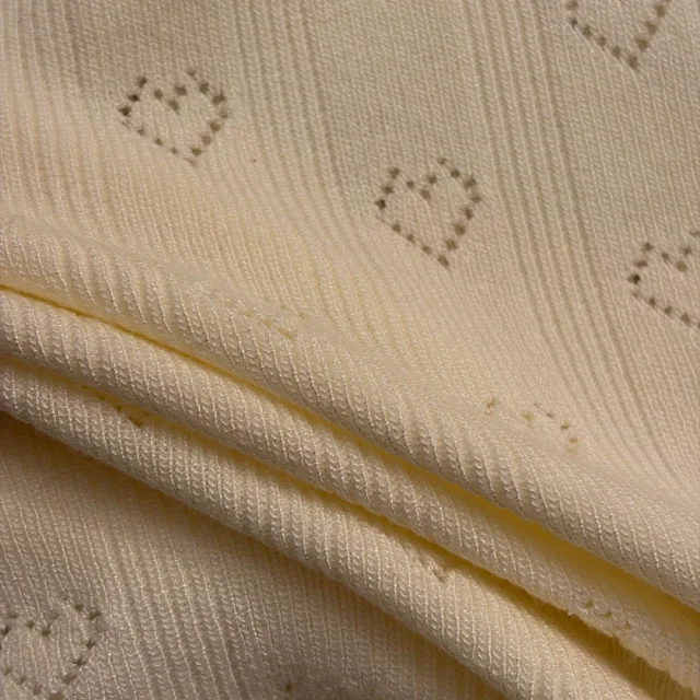 Miu Knitwear Short-Sleeve Heart Pointelle Knit Top with Bow Detail product detail image 9