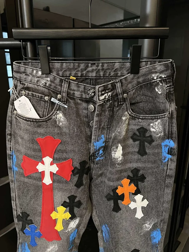 Unbranded Jeans Two-tone washed denim with multicolor cross appliqués and raw hems product detail image 6