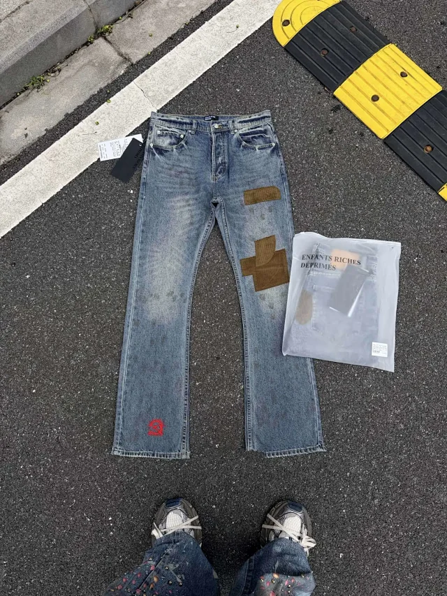 Enfants Riches Déprimés Jeans Washed patchwork flared with embroidered motif product detail image 8