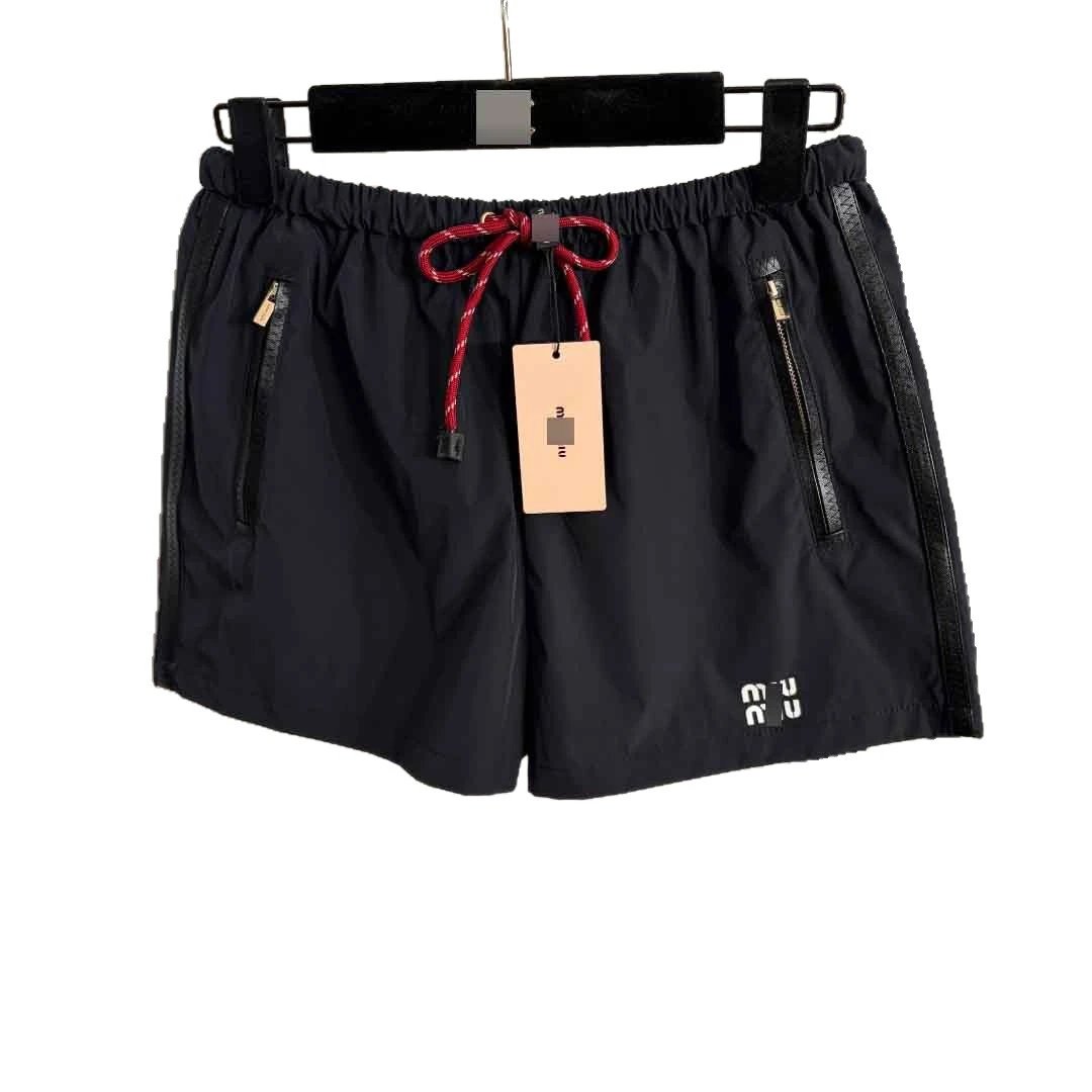 Miu Shorts Nylon with elastic drawstring waist and zip pockets image 5