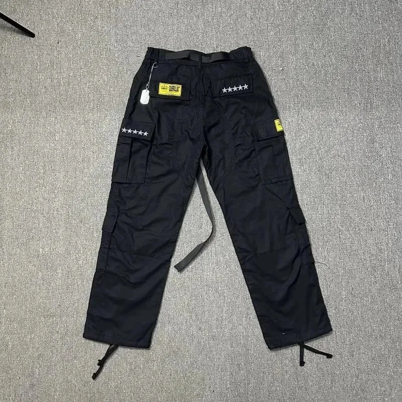 Black Cargo Pants with White Graphic Patch and Yellow Label Tactical Style