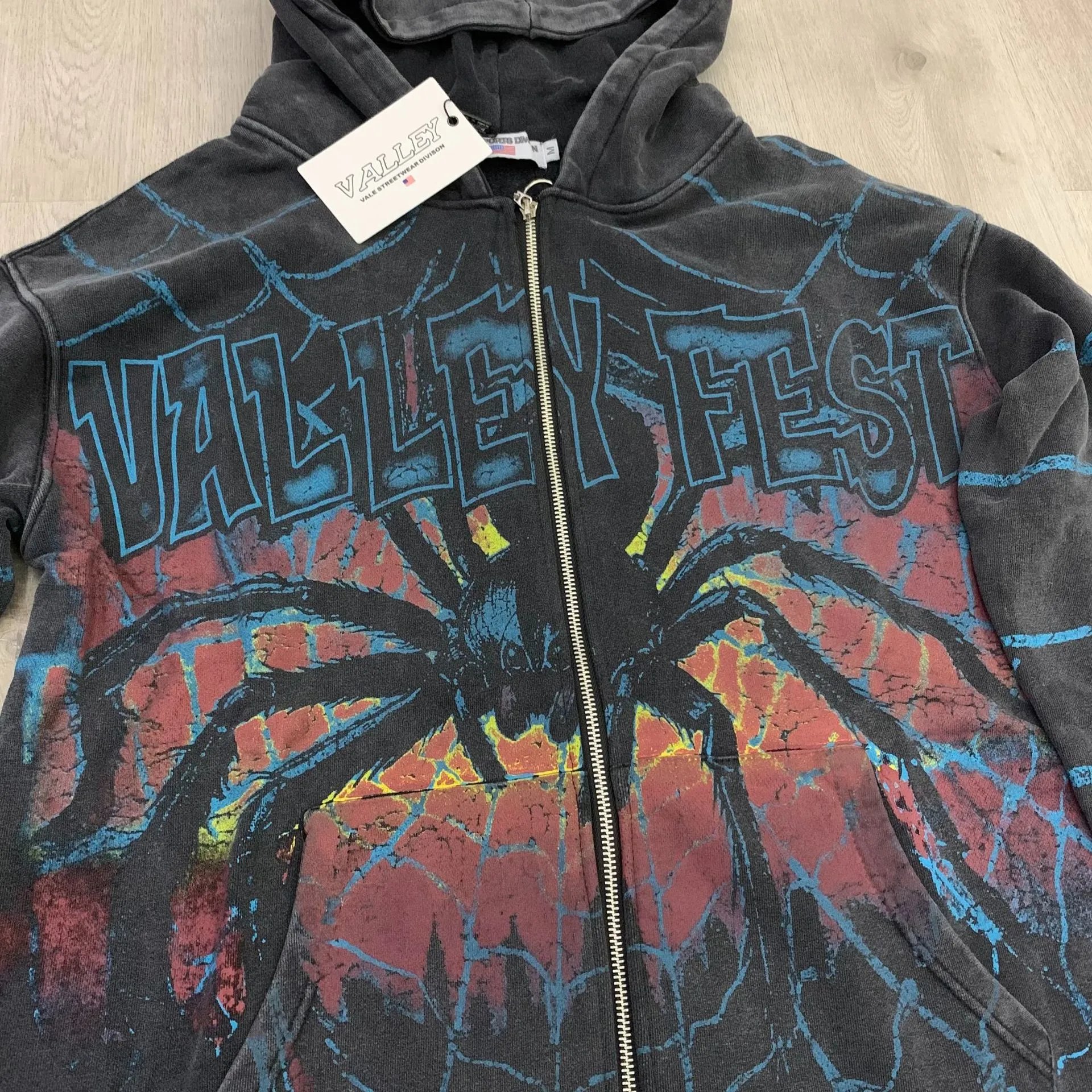 Black Hooded Zip-Up Sweatshirt With Blue Barbed Wire Print