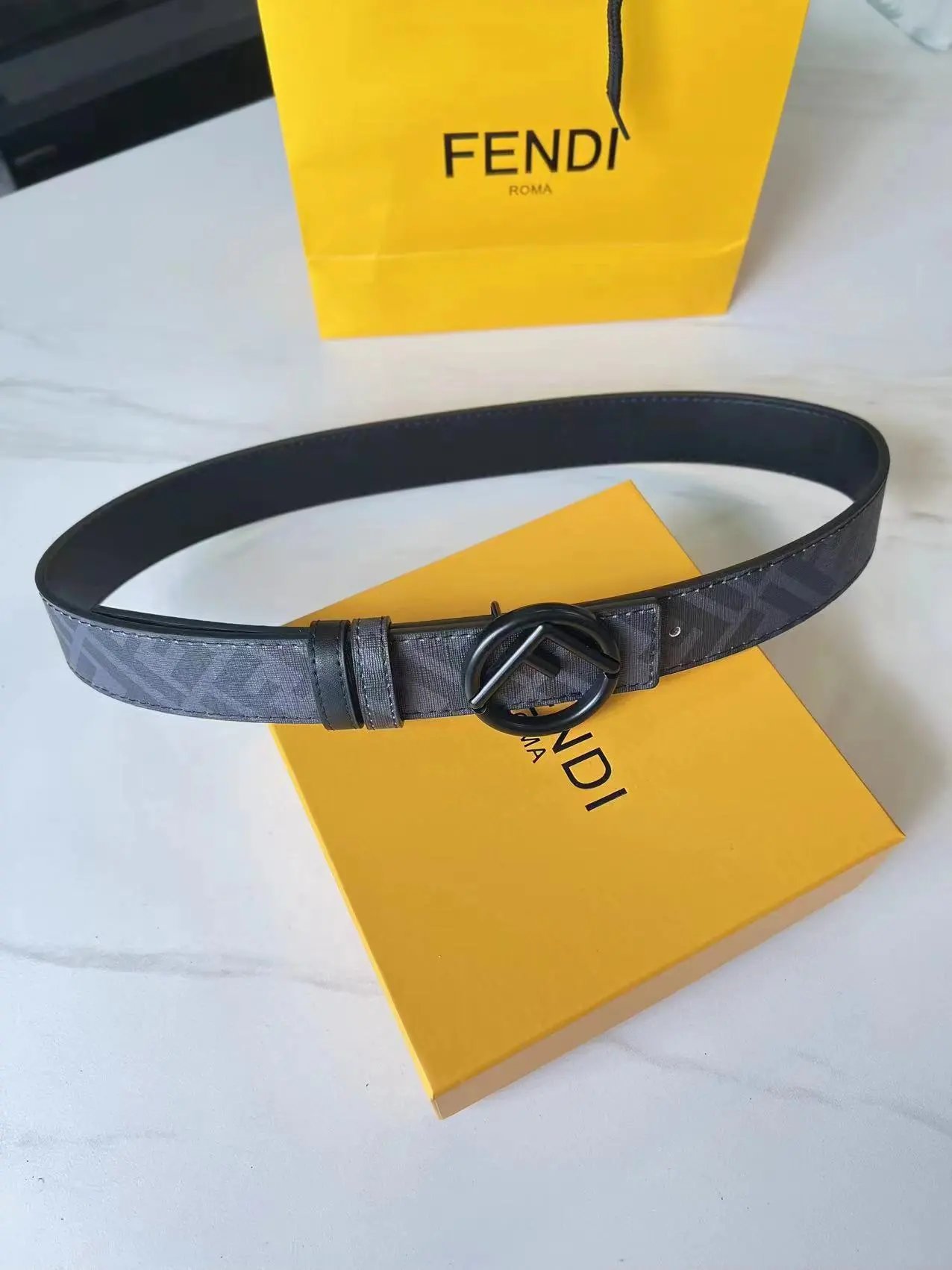 Fendi Belts FF Monogram Double-F Buckle Belt — Black flower with a round black button