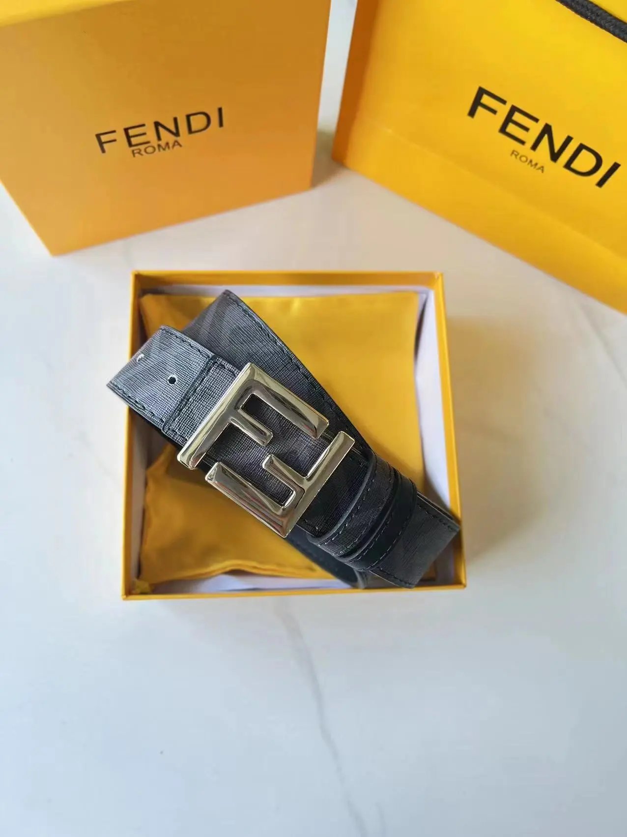 Fendi Belts FF Monogram Double-F Buckle Belt — Black flower with a gold buckle
