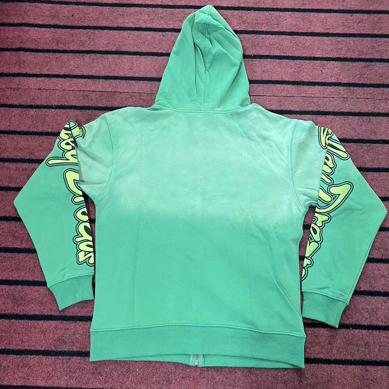 Mint Green Hooded Sweatshirt With Neon Graphic Sleeve Print