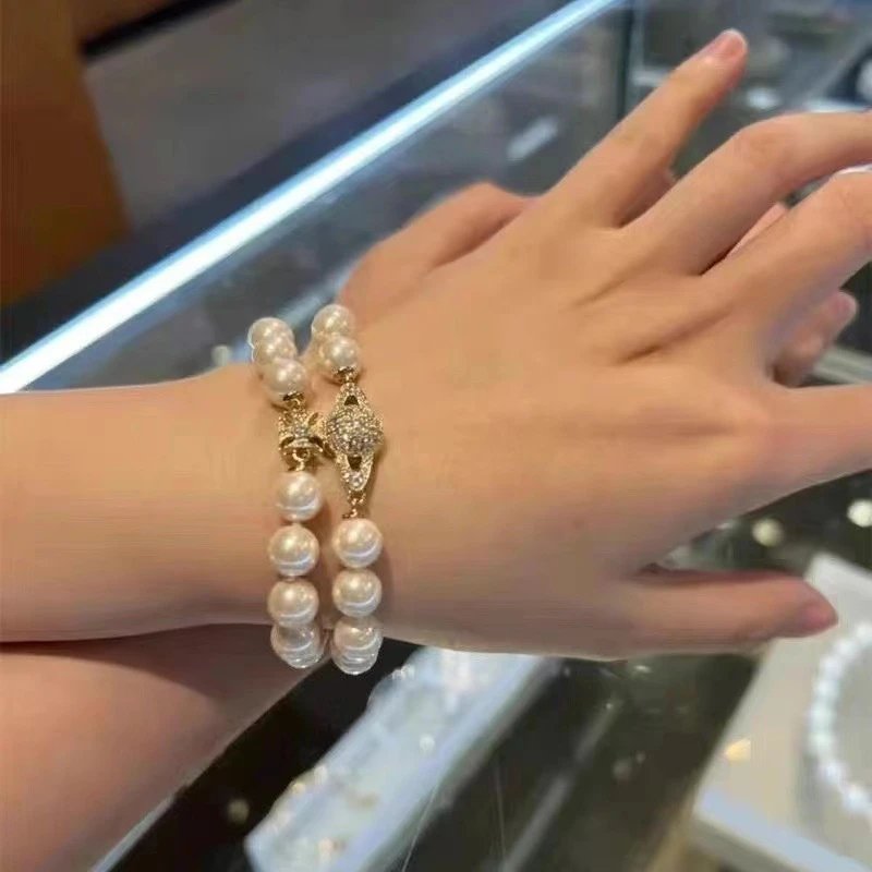 Pearl Beaded Gold Tone Crystal Charm Bracelet