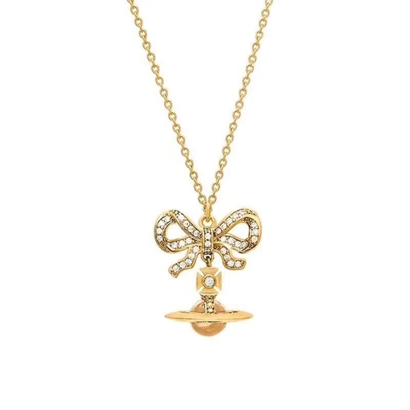 Vivienne Westwood Orb Purple Crystal Bow Pendant Necklace